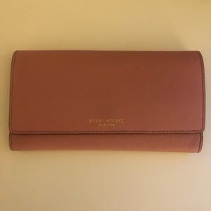 Henri Bendel pink tri-fold wallets
